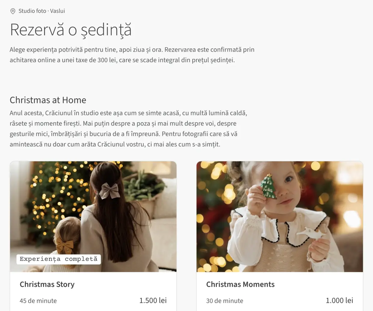 Captură din pagina de rezervări a studioului foto Ancuța Bucur: titlul Rezervă o ședință și cele două pachete ale ședinței Christmas at Home, fiecare cu fotografia, durata și prețul în lei.